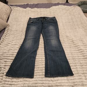 Medium wash Hudson bootcut jeans size 30.